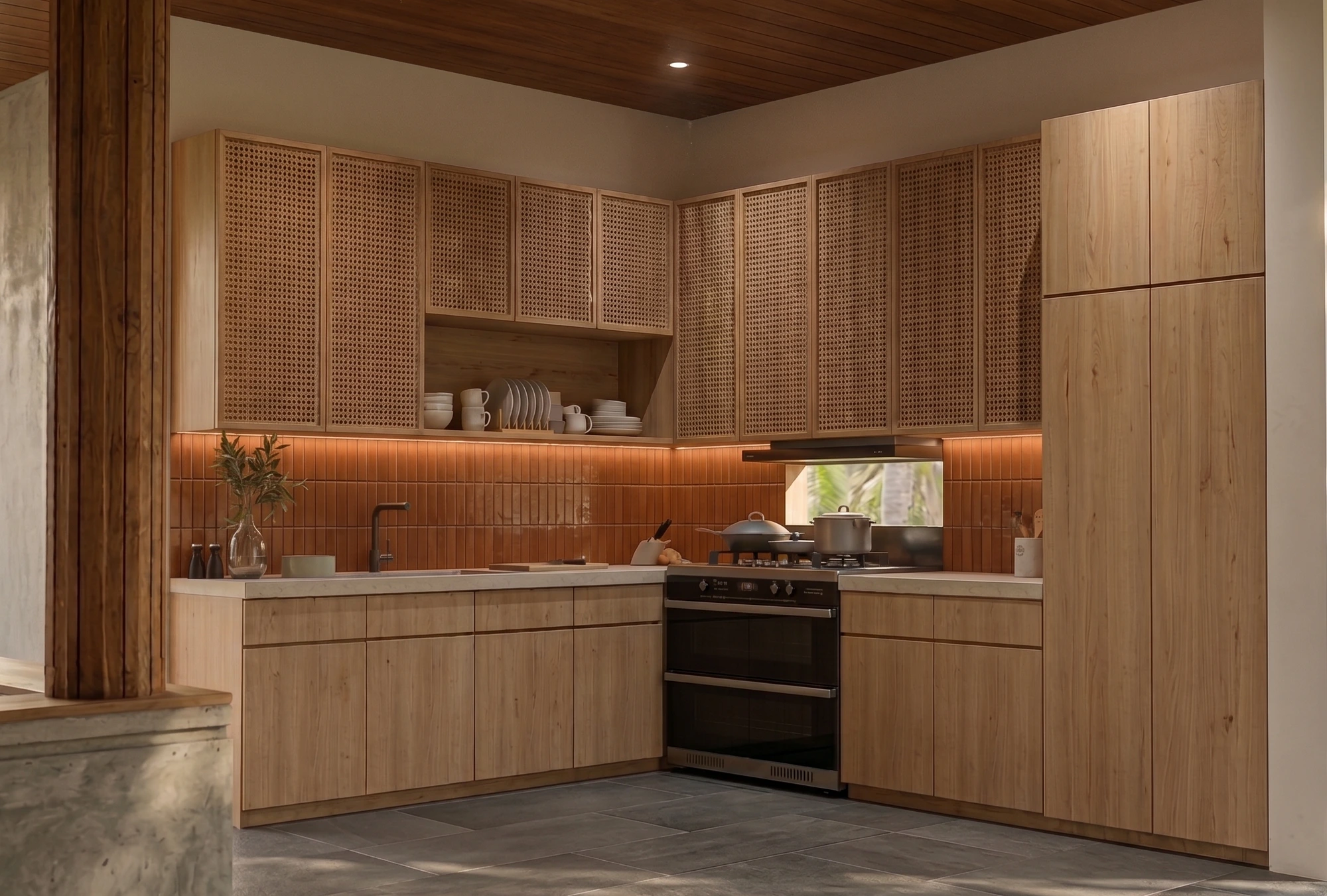 Mr. Vishnudeth Residence — Kitchen — cane-webbed uppers over a burnt-clay backsplash