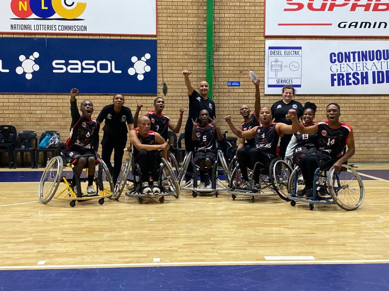 The Langa Scorpions team celebrating on the court
