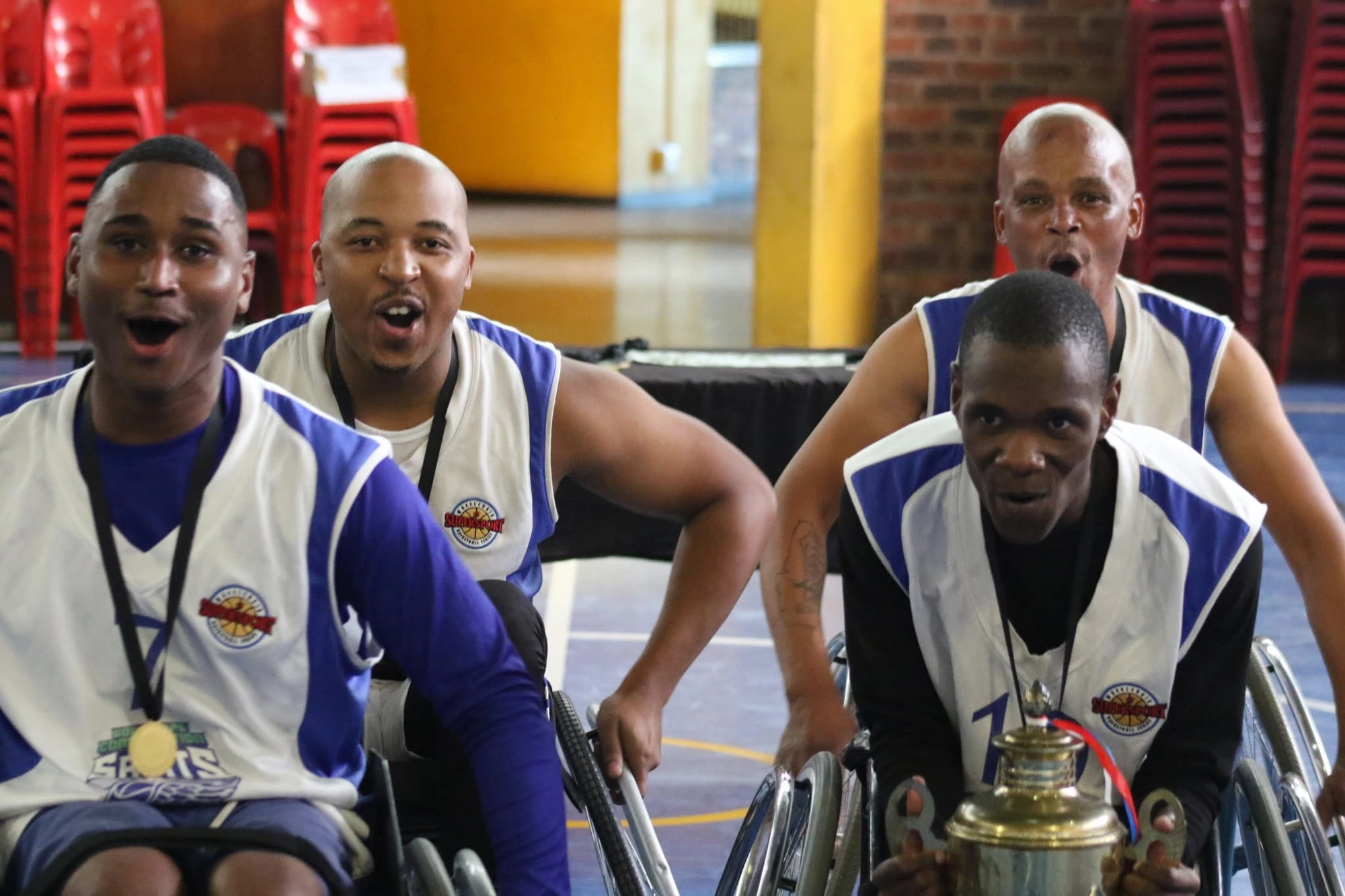 Langa Scorpions celebrating with the championship trophy