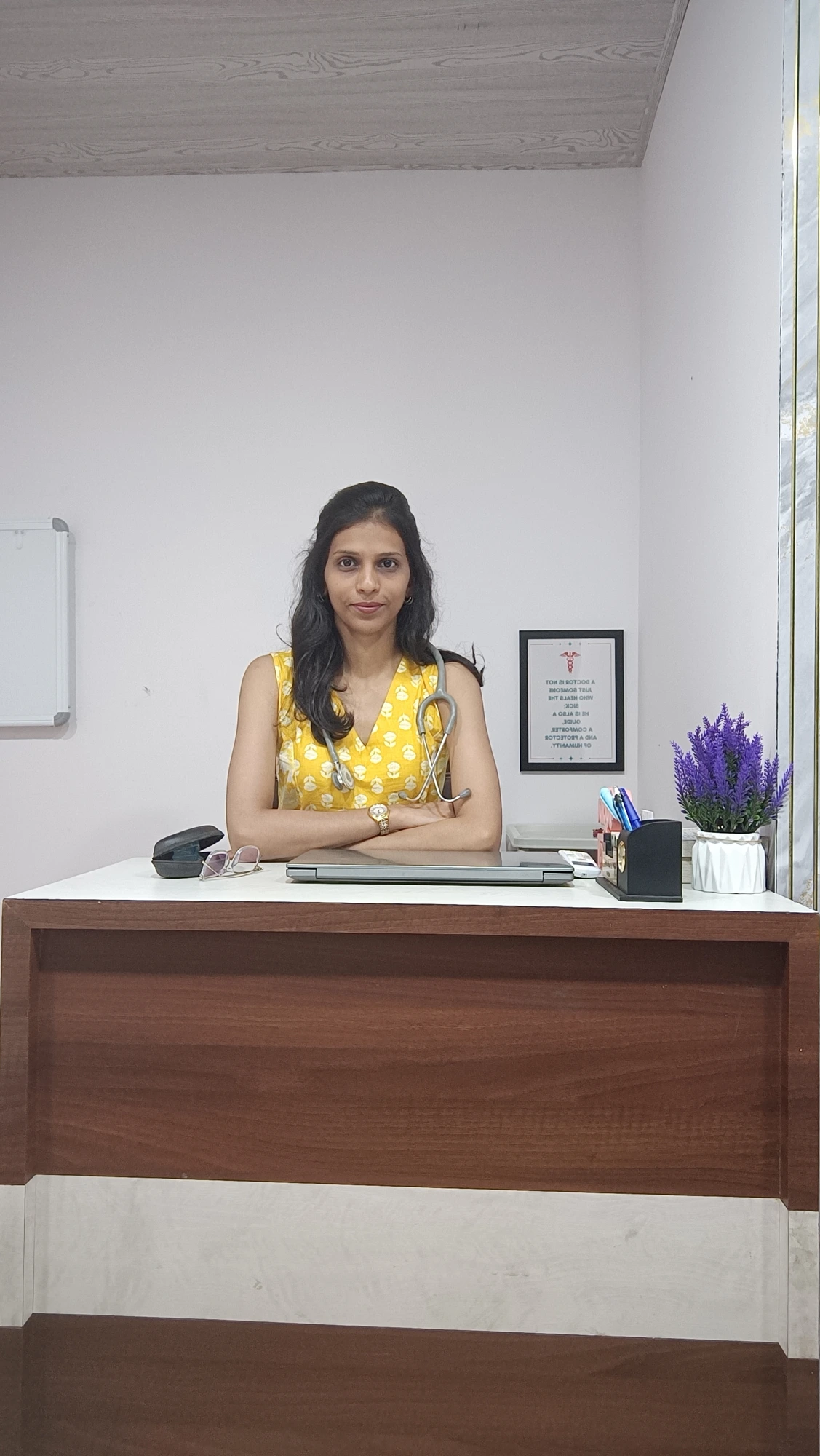 Dr. Mugdha Adhikari at the consulting desk