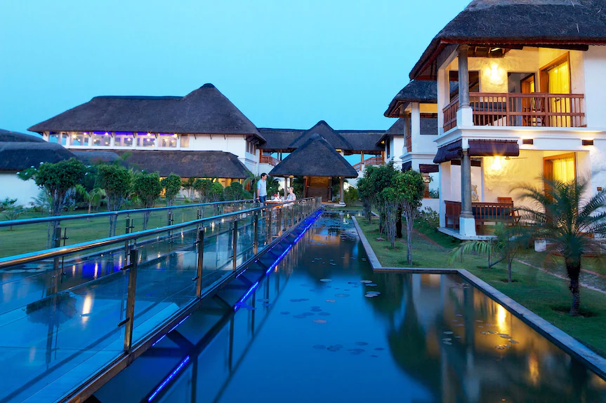 The glass walkway over the lotus pond at dusk, Le Pondy