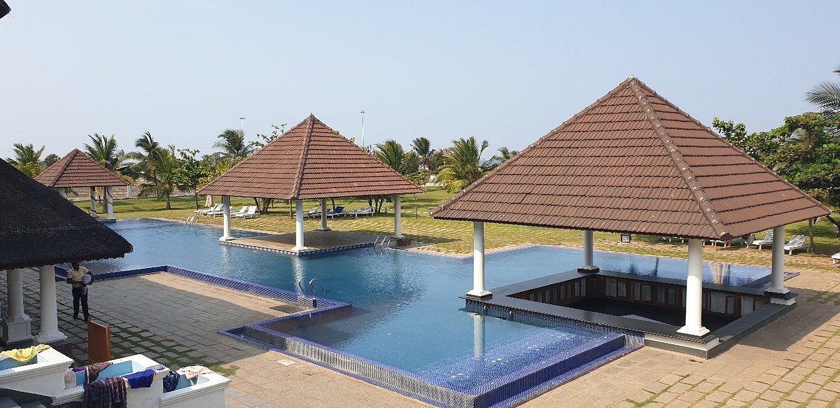 The main pool & thatched gazebos