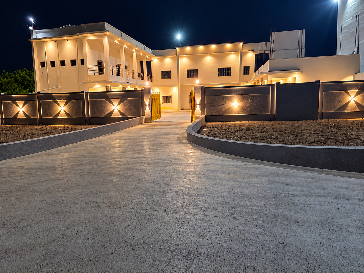 SVS Hostel building illuminated at night
