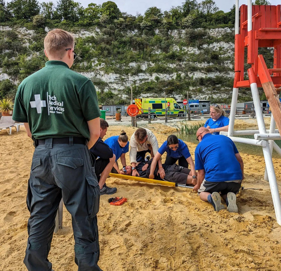 Tech Medical Services instructor overseeing a practical first aid training scenario
