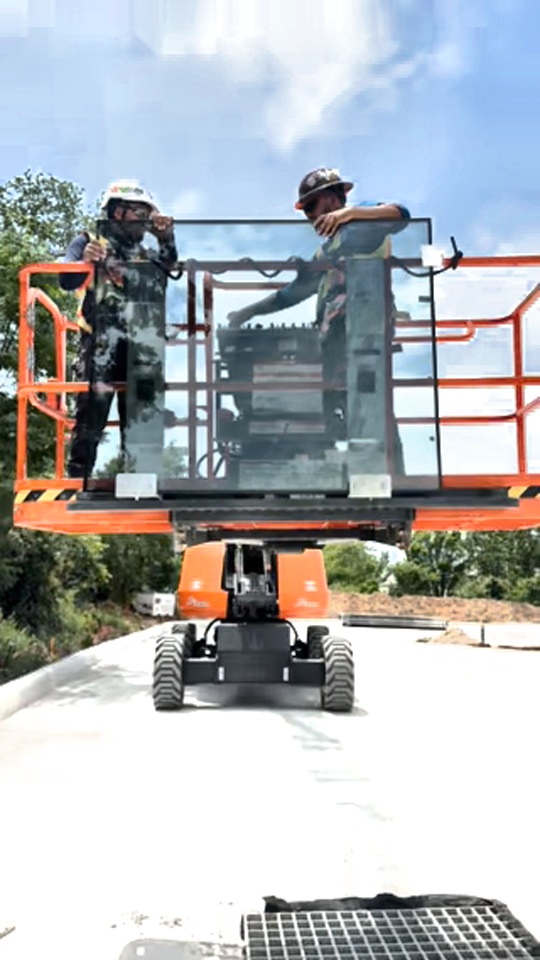 Highwall™ Lift helping construction crews safely install insulated metal panels on a data center