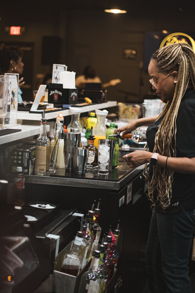Behind the bar.